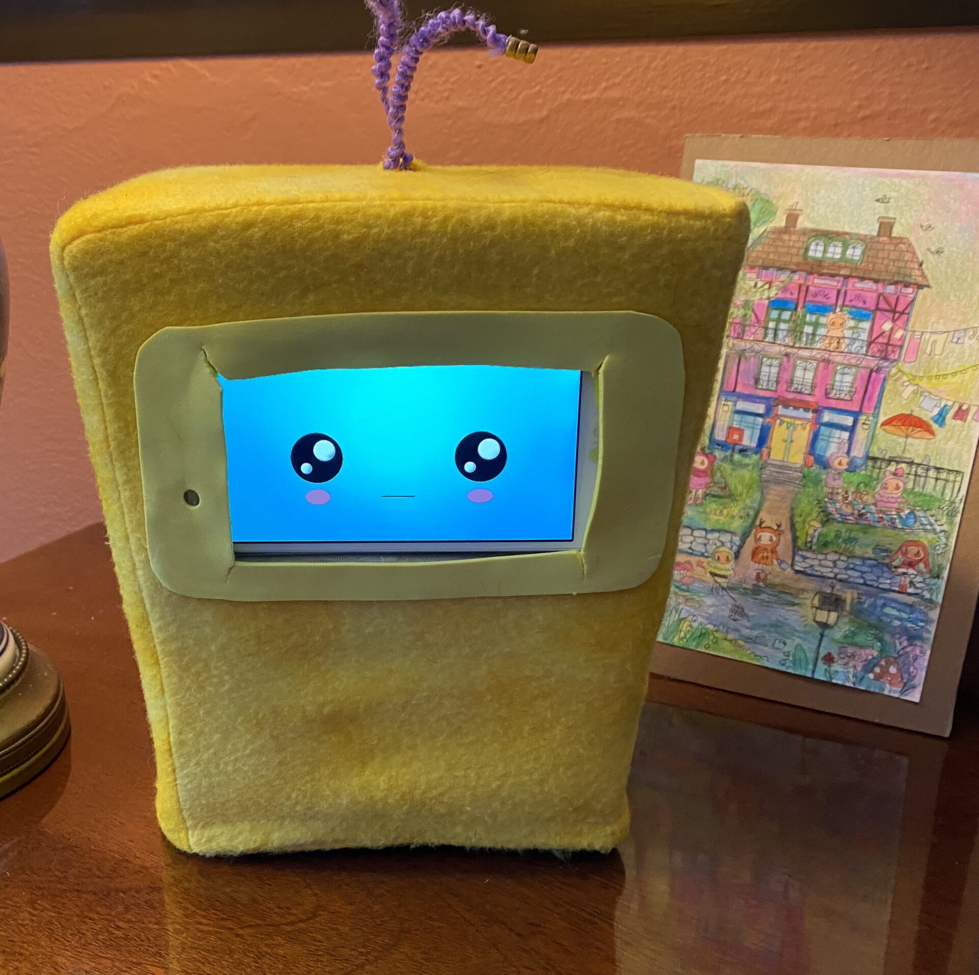 yellow robot named migo